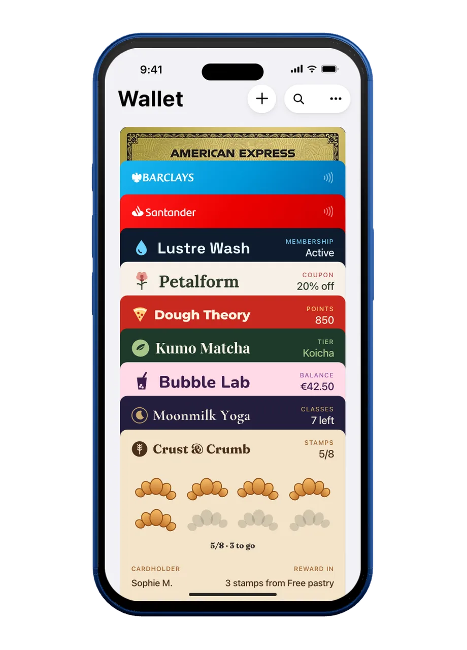 An iPhone showing Apple Wallet: TAPPI cards from seven example businesses next to bank cards